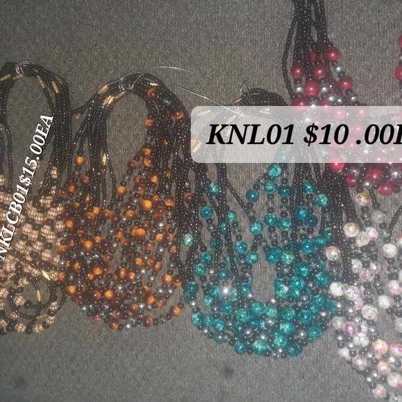 Ladies hand Bags and steak fans and ART,necklaces. Keys chains. - Picture 8 of 16